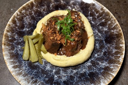 Slow-cooked beef with potato purée and demi-glace sauce